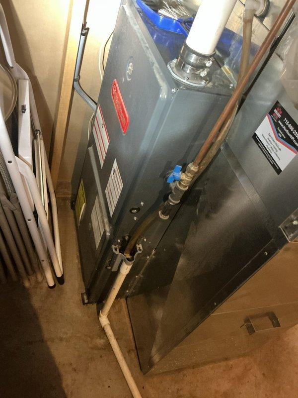 Diagnosed water flow issues stemming from sediment infiltration following well leak repair. Flushed multiple waterlines to clear debris and identified corroded tee fitting, which was subsequently replaced to restore proper system function. Confirmed pressure tank was properly cleaned with adequate pressure maintained to water softener.