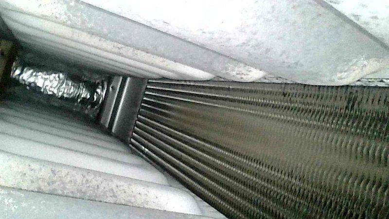 Responded to a no-heat service call for a 3-year-old furnace exhibiting prolonged heating cycles (one hour to increase one degree). Upon inspection of the system, found the existing 1-inch filter had been recently changed by homeowner. Visual examination of the evaporator coil showed normal condition without obstructions. Verified proper system operation after service, with normal heating performance restored.