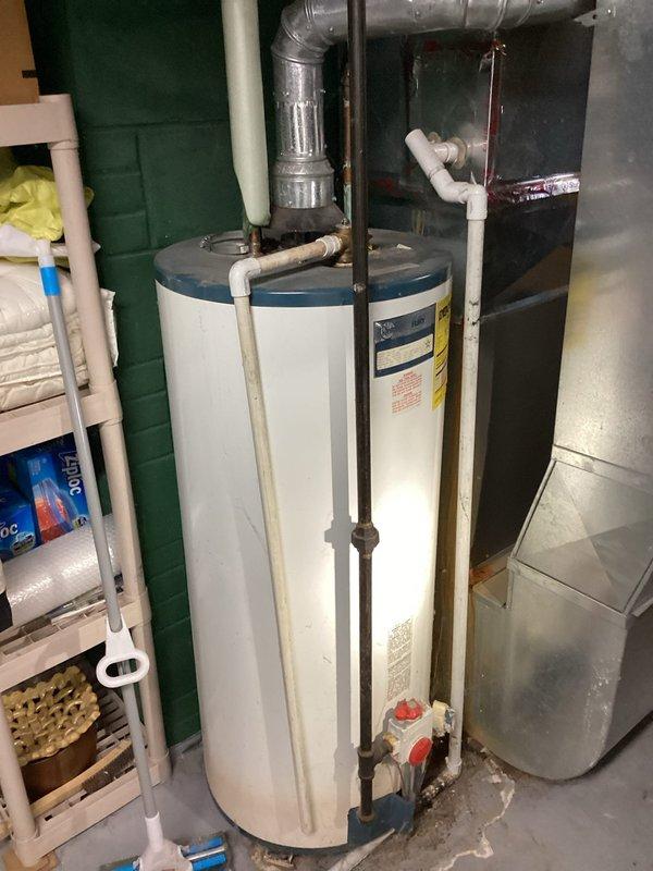 Responded to warranty call for laundry drain backing up. Diagnosed clog in 3" drain under concrete. Issue requires specialized equipment beyond scope; referred customer to drain cleaning company. If problem persists after professional drain cleaning, recommendation is to replace old cast iron piping.