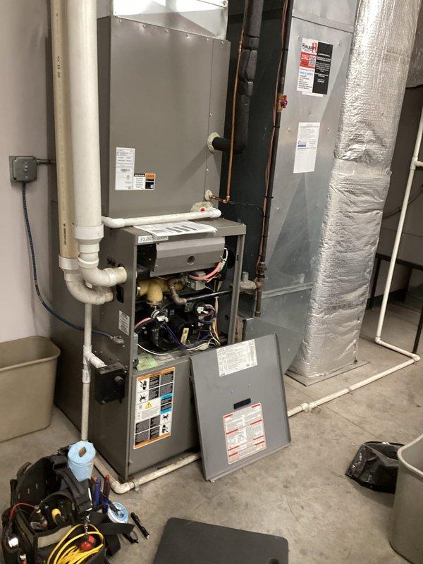 Responded to service call for lounge furnace and overhead unit heater issues. Diagnosed and replaced failed blower motor in lounge furnace, restoring heat functionality. Performed assessment on overhead unit heater above boiler room which requires combustion blower replacement; customer approved repair for furnace motor only.