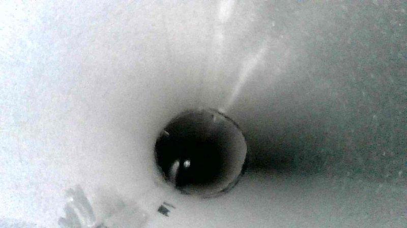 Performed annual furnace tune-up on 1-year-old FRP system under Family Rewards agreement. Cleaned flame sensor, verified proper condensate drainage, and confirmed correct gas pressure with 55° temperature rise. Addressed homeowner's concern about cold rooms by adjusting airflow distribution through strategic vent closure. Discovered and resolved humidifier issue where water supply was closed off, preventing proper operation. System now functioning correctly with improved airflow balance.