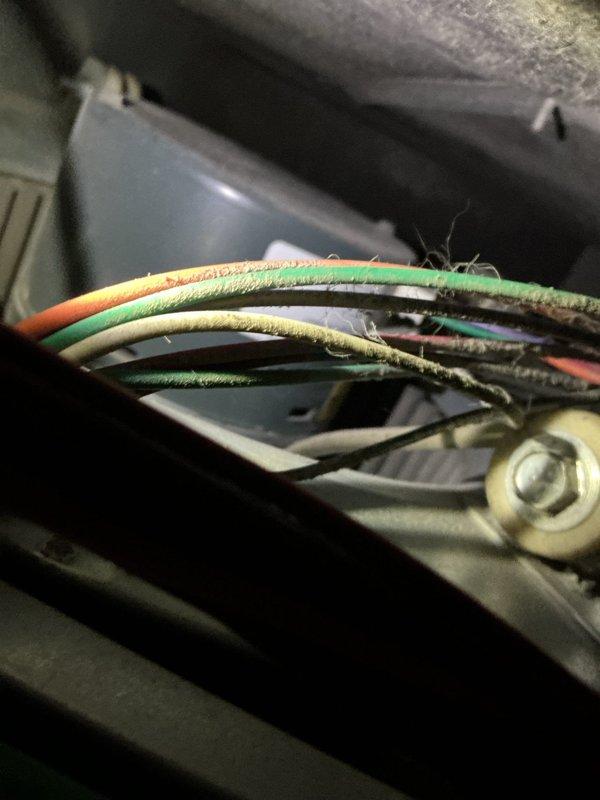 Diagnosed 17-year-old Rheem high efficiency furnace with no heat issue showing fault codes 4 and 5. Inspection revealed seized inducer draft motor, consistent with customer's report of unusual noise and harder operation prior to failure. Replaced draft motor assembly, restoring proper system function. Customer was informed that complete furnace replacement is an option to consider given the unit's age.