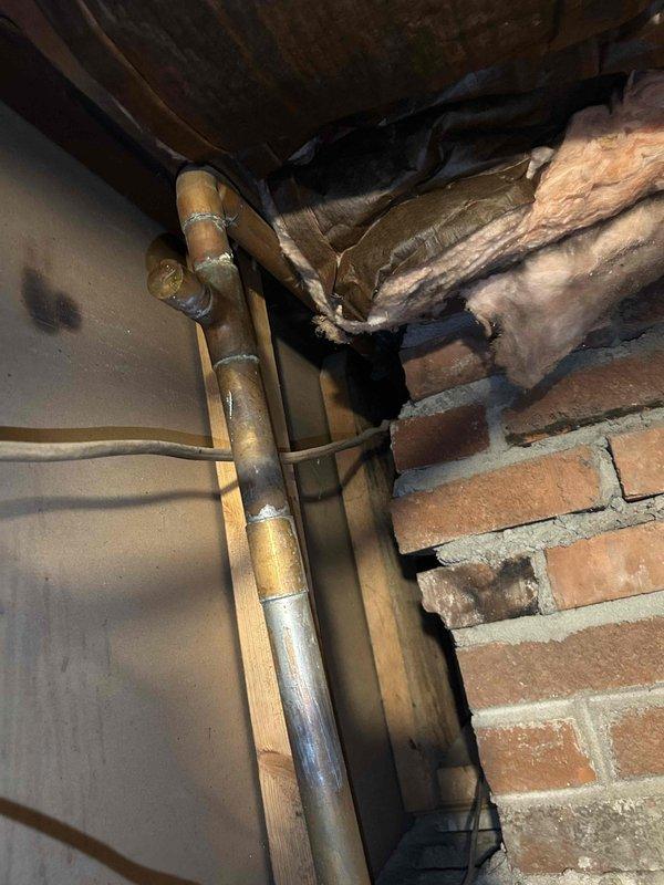 Diagnosed no heat issue on aging Weil-McLain boiler that was repeatedly shutting down and requiring manual resets. Determined system was suffering from air lock condition and discovered ruptured expansion tank. Replaced expansion tank and abandoned frozen basement loop to restore proper operation.