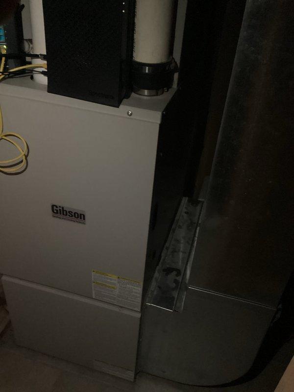 Responded to emergency service call for burst water supply line in attached garage. Discovered two splits in the pipe caused by freezing due to garage door being left open overnight. Shut off water supply to the garage, removed damaged section, and installed new supply line. Advised customer to maintain consistent heat in the garage to prevent future freeze damage.