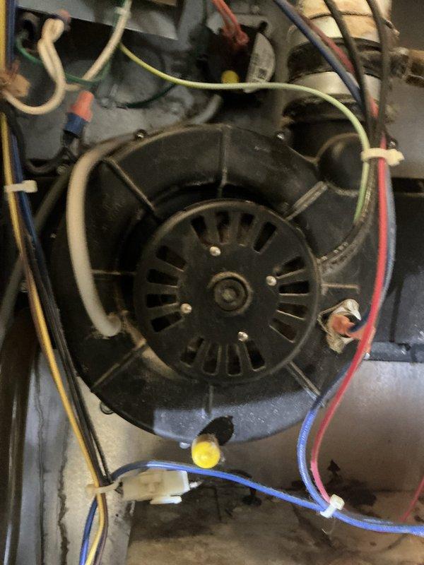 Responded to no heat call for 17-year-old Nordyne high efficiency furnace. Diagnosed seized draft motor as the cause of system failure. Customer opted to consult with relative in HVAC industry regarding replacement options for draft motor or complete system.
