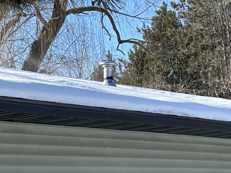 Responded to customer concern regarding furnace exhaust smell and respiratory issues. Performed comprehensive inspection of 20-year-old furnace including heat exchanger examination (no cracks or holes found), exhaust venting verification, and filter system check. Identified large floor opening beneath furnace allowing significant cold air infiltration, likely drawing in external diesel exhaust temporarily. Noted minor water leakage on one pipe, but no significant defects requiring shutdown. Provided bath replacement estimate per customer request.