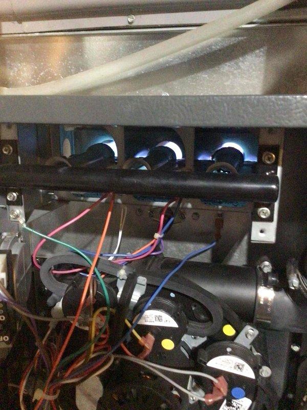 Responded to no heat call for 10-year-old furnace that was intermittently starting then shutting off. Diagnosed severely rusted burners restricting gas flow. Performed thorough cleaning of burner assembly to restore proper flame pattern and ignition sequence. Submitted parts order for replacement components to ensure reliable operation.