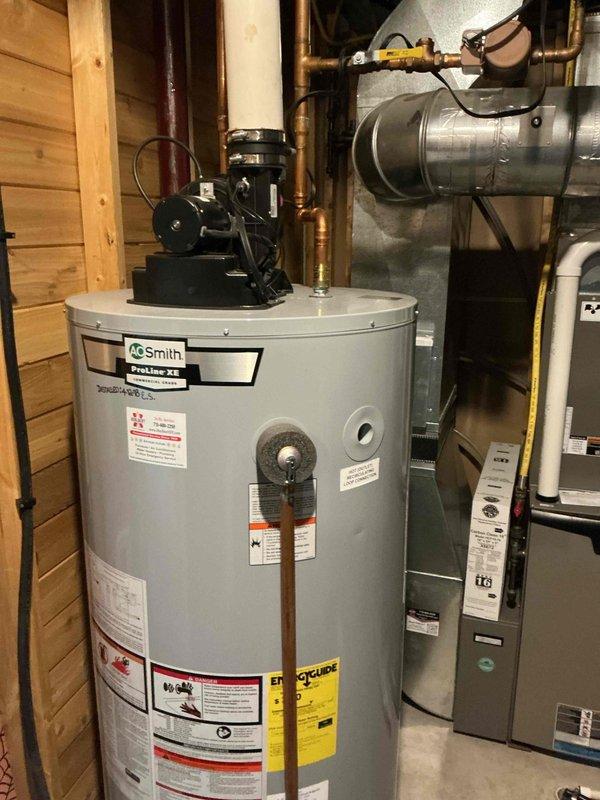 Completed installation of customer-supplied Gerber Viper ADA elongated white toilet and Moen 4-inch on center bathroom faucet in downstairs bathroom. Replaced shower cartridge in Moen shower valve to eliminate howling noise issue that customer was experiencing during operation.