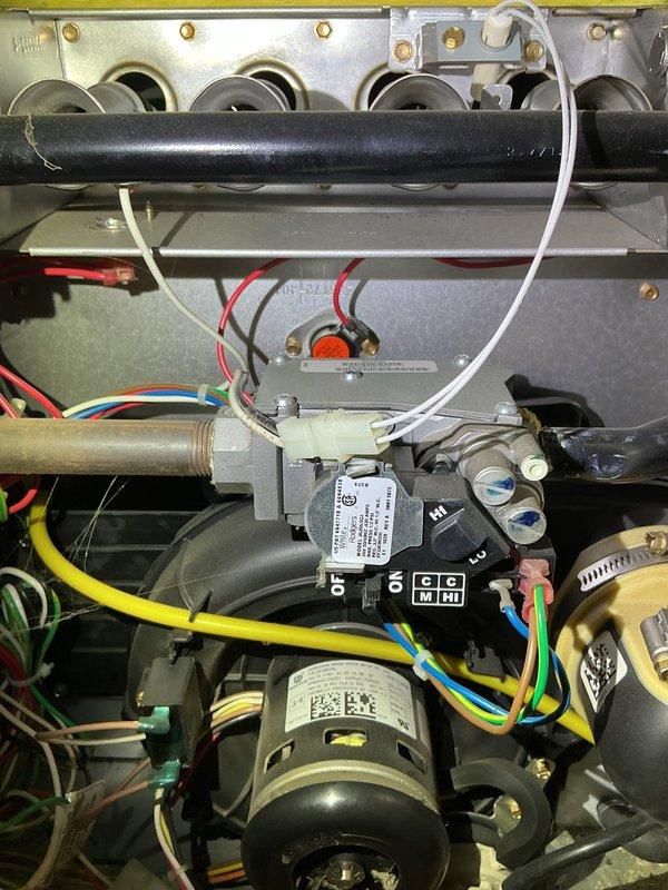 Performed annual furnace maintenance on 9-year-old Bryant high-efficiency system. Inspected all components with access panels removed. Blower wheel was found clean and system is functioning properly. Visual inspection of internal components showed normal wear consistent with unit age.