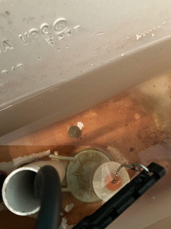 Inspected four toilets reported as leaking. Diagnosed one toilet with a faulty fill valve causing continuous running. Removed corroded original fill valve showing significant mineral deposits and rust. Installed new fill valve assembly to restore proper tank filling operation and eliminate water waste.