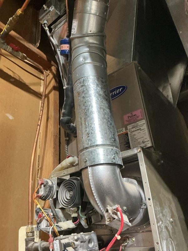 Performed routine inspection on two HVAC units as requested, focusing on the older Carrier system that showed signs of wear. Examined electrical connections which displayed evidence of aging, with particular attention to wiring integrity and terminal connections. Determined that the older unit requires either comprehensive servicing or replacement due to component deterioration and efficiency concerns.