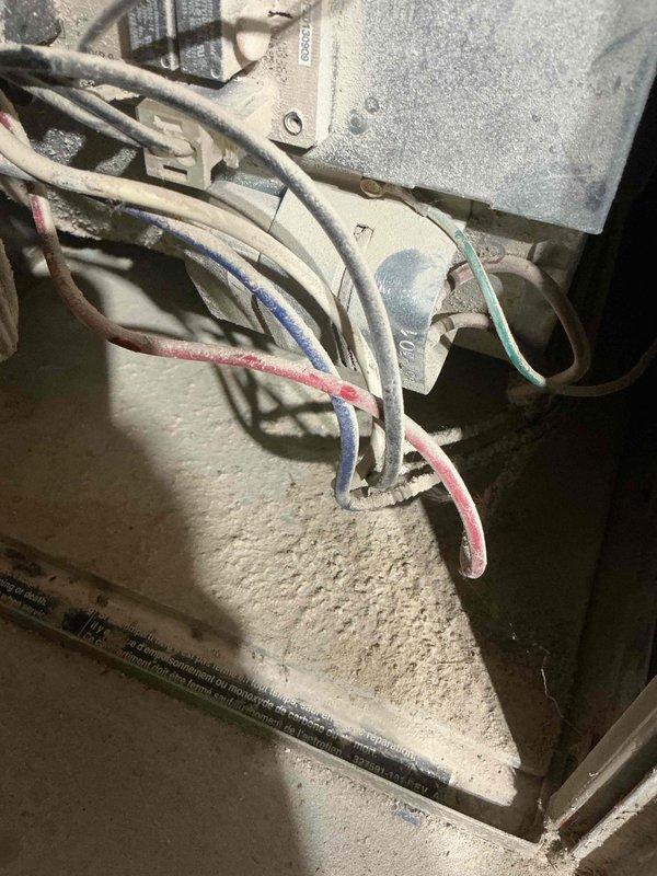 Performed routine inspection on two HVAC units as requested, focusing on the older Carrier system that showed signs of wear. Examined electrical connections which displayed evidence of aging, with particular attention to wiring integrity and terminal connections. Determined that the older unit requires either comprehensive servicing or replacement due to component deterioration and efficiency concerns.