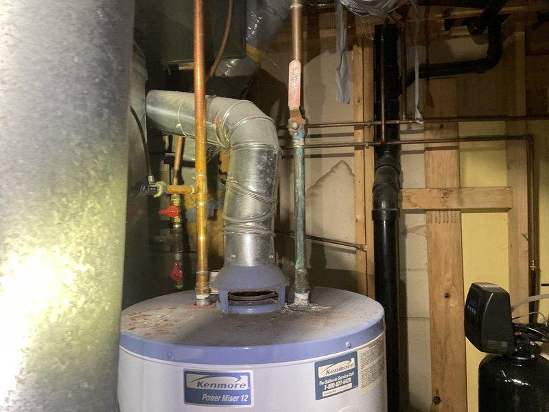 Conducted comprehensive estimate for replacement of existing Kenmore Power Miser 12 water heater and installation of new gas piping to accommodate customer's new gas range. Inspected current installation, including venting system, copper supply lines, and existing valve configuration. Documented condition of utility area with photographs to ensure accurate quote preparation. Customer requested callback notification prior to future service visits.