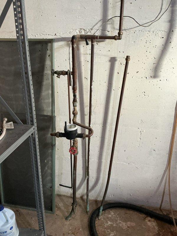 Performed complementary flush of tankless water heater using haymaker solution as scheduled. Inspected existing copper plumbing system and connections in basement utility area. Completed full system flush to remove mineral buildup and ensure optimal operation of the on-demand water heater.
