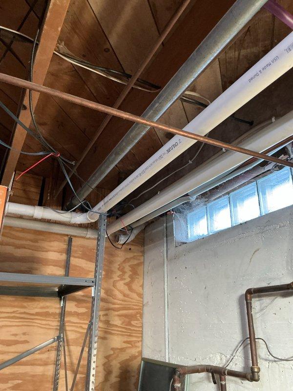 Performed complementary flush of tankless water heater using haymaker solution as scheduled. Inspected existing copper plumbing system and connections in basement utility area. Completed full system flush to remove mineral buildup and ensure optimal operation of the on-demand water heater.