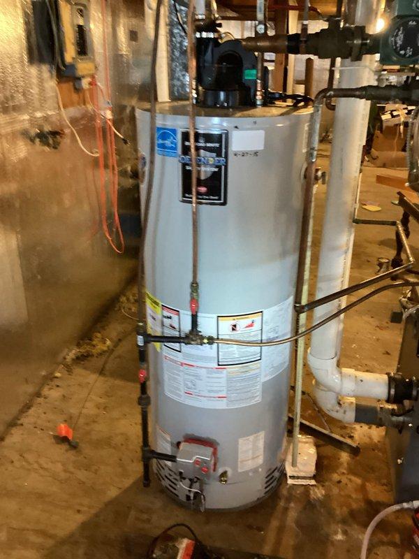 Diagnosed boiler system operating at 30% capacity with outlet temperature of 170°. System functioning as designed but requires cleaning when weather permits; current exterior temperature (-20°F) made immediate cleaning inadvisable. Identified significant heat loss due to structural wall damage allowing cold air infiltration around rim joist; recommended structural repairs to improve heating efficiency. Customer will schedule future cleaning service.