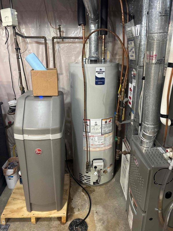 Successfully installed a 50-gallon natural gas standard vent water heater, replacing the existing unit of similar specifications. All connections were properly secured and the system was verified to be functioning correctly before completion.