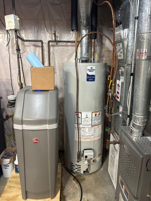 Successfully installed a 50-gallon natural gas standard vent water heater, replacing the existing unit of similar specifications. All connections were properly secured and the system was verified to be functioning correctly before completion.