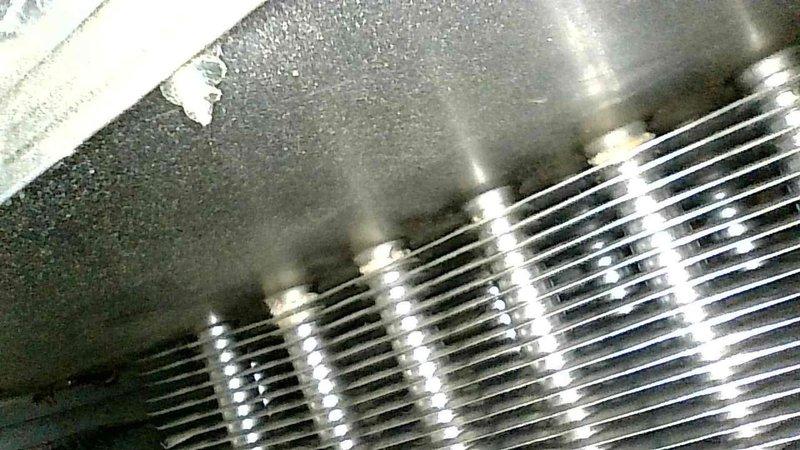 Responded to no heat call for 15-20 year old system experiencing intermittent operation. Diagnostic inspection revealed multiple issues: plugged condensate drain, significant ice accumulation at exhaust vent, and dirty flame sensor. Performed standard maintenance cleaning of flame sensor and critical components, cleared drainage system, and removed ice buildup. Inspected heat exchanger for integrity. Left space heaters with customer as precautionary measure pending potential follow-up service.