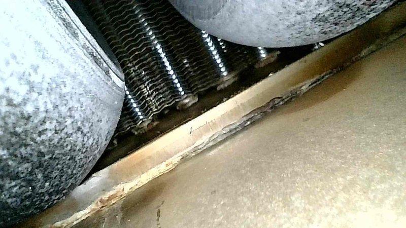 Responded to no heat call and diagnosed tripped inducer limit caused by leaking collector box and compromised condensate pump. Observed early signs of secondary heat exchanger deterioration and failing inducer motor bearings. Temporarily restored heat operation while advising customer against continuously resetting safety switches. Recommended system replacement over costly repairs due to multiple component failures and potential safety concerns.