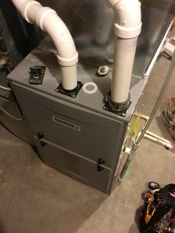 Responded to a no-heat service call for an aging HVAC system. Upon arrival, observed the fan was operational. Performed multiple system cycles, inspected internal components, and tested the flame sensor which showed normal readings. System appeared to be functioning properly during the service visit. Advised customer to monitor the unit for any recurring issues.