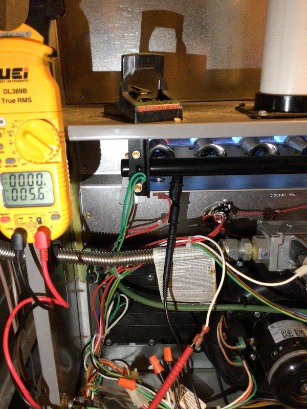 Responded to a no-heat service call for an aging HVAC system. Upon arrival, observed the fan was operational. Performed multiple system cycles, inspected internal components, and tested the flame sensor which showed normal readings. System appeared to be functioning properly during the service visit. Advised customer to monitor the unit for any recurring issues.