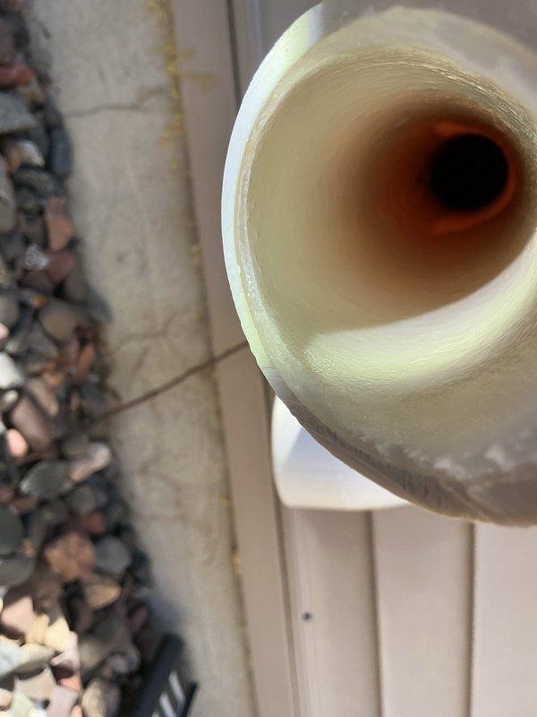 Responded to no heat complaint on a 2-year-old furnace system that was tripping on pressure switch. Diagnosed issue as frozen condensate drain trap caused by cold air intake positioned adjacent to the trap. Temporarily replaced inducer motor for diagnostic purposes, which confirmed the source of high-pitch noise was not the inducer itself. Cleared and cleaned the frozen drain trap, which resolved the operational issues and restored proper system function.