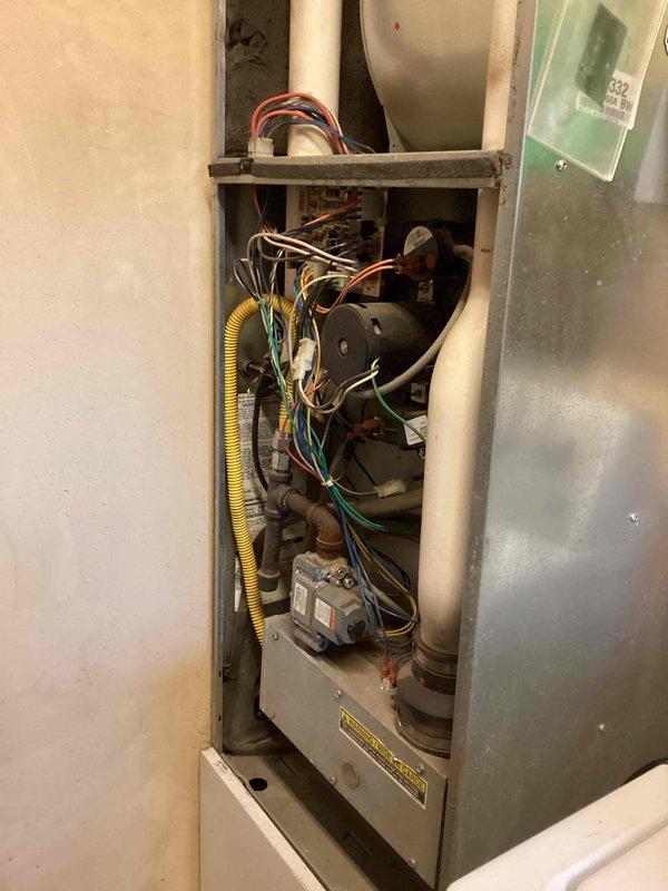 Diagnosed no-heat condition caused by a faulty main limit switch that was stuck in the open position. Performed temporary repair by relocating functional limit switch from blower motor assembly to main position and installing an alternative limit switch at the blower location. System restored to operational status, but recommended follow-up service to install proper OEM limit switch for permanent resolution.