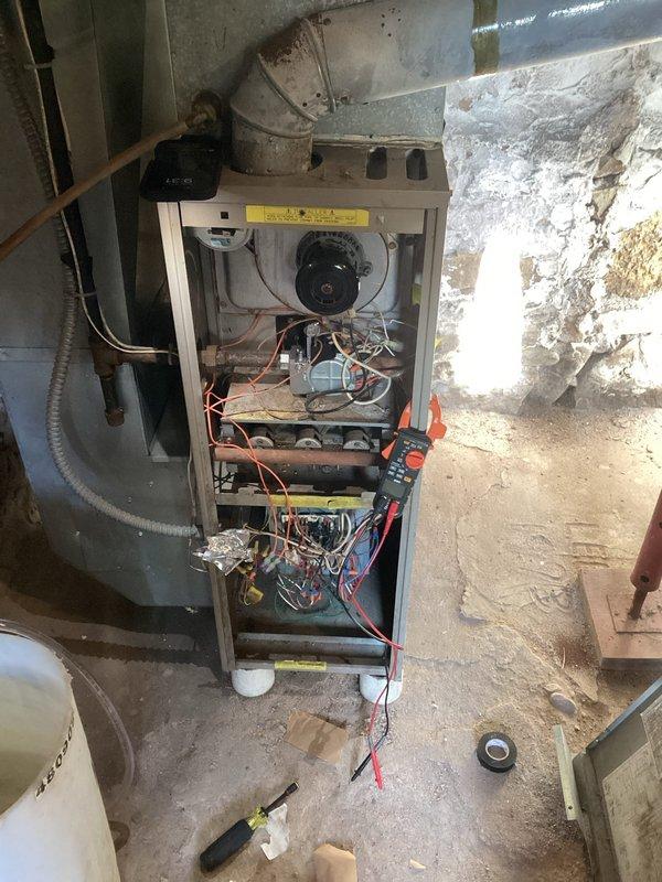 Diagnosed and repaired 5-year-old furnace with no heat issue; identified cracked inducer tubing which was fixed, allowing burners to ignite. Further diagnosis revealed failed blower motor and pressure switch causing high limit trip; recommended replacement of these components to restore proper system operation.