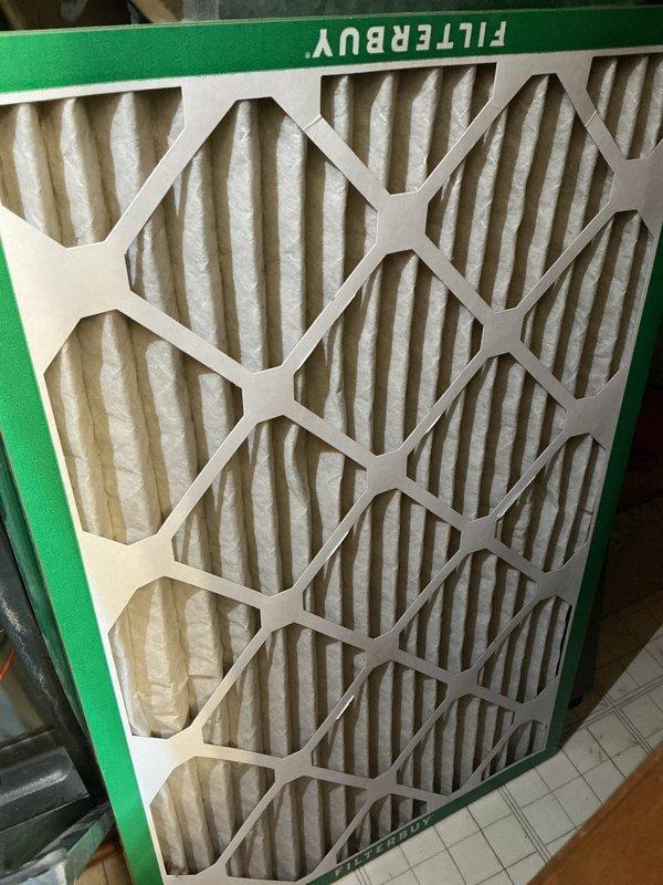 Diagnosed Goodman furnace (50+ years old) with no heat condition. Found unit short cycling and locking out due to overheating. All components tested operational, but identified high limit switch activation caused by restricted airflow. Recommended continuous fan operation at thermostat and replacement of thick filter with maximum MERV 7 rating. Observed temperature stress points on heat exchanger and intermittent shutdown possibly related to gas valve closure or voltage fluctuations. Scheduled follow-up for complete furnace replacement due to age and condition.