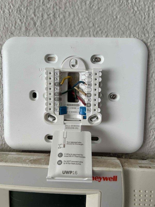 Responded to service call for unresponsive thermostat. Diagnosed blank display despite battery replacement, with heat still functioning but customer unable to make adjustments. Installed new Honeywell T4 thermostat, properly configured dip switches for first and second stage furnace control, and verified complete system operation of the Tempstar unit.