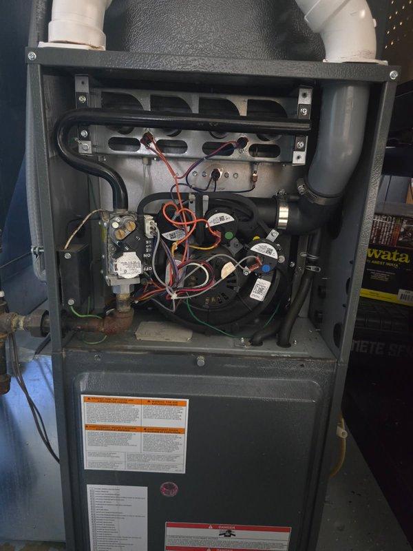 Responded to no-heat service call for furnace with intermittent ignition failure displaying "LO" error code. Diagnosed faulty gas valve failing to open despite receiving proper power signal. Temporarily restored operation through manual intervention, but observed severely rusted burners contributing to flame dropout issues. Performed visual heat exchanger inspection with no visible compromises detected. Recommended replacement of gas valve and burners along with complete system tune-up as permanent solution. Customer informed about high probability of recurring failure and discussed equipment replacement options.