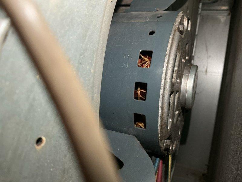 Diagnosed 16-year-old furnace with insufficient heating due to multiple critical issues including cracked heat exchanger, failing flame sensor, burn marks on control board, oil-leaking blower motor, and improper Merv 11 filter installation. Found evidence of previously bypassed high limit safety switch, creating dangerous operating conditions. Advised customer that repairs cannot be performed with bypassed safety features and recommended system replacement due to compromised heat exchanger integrity.