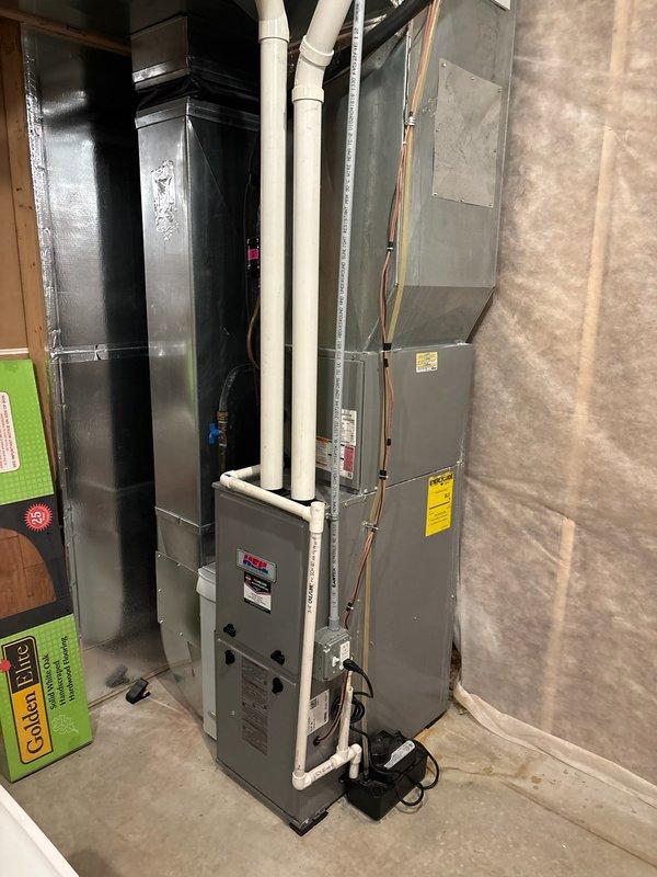 Responded to no heat complaint for a residence with dual furnace system. Diagnosed frozen exhaust vent on ICP furnace causing intermittent operation and breaker trips. Cleared ice blockage from exhaust pipe, restored proper operation, and verified functionality of both the ICP and Gibson furnaces.