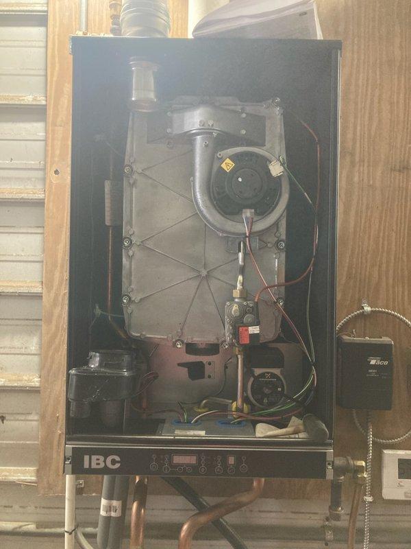 Responded to no-heat call for 3-year-old boiler system. Diagnostic testing revealed zero pressure on boiler due to malfunctioning backflow preventer. Replaced backflow preventer and auto fill valve with ball valve to restore proper system operation and heat production.