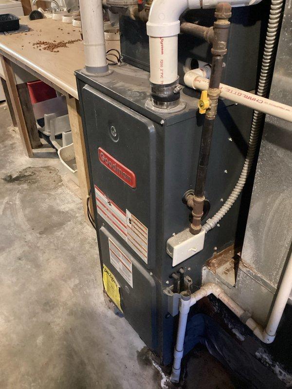 Responded to no-heat call for a 13-year-old Goodman furnace system. Upon arrival, customer reported intermittent operation with heat working overnight but failing during inspection. Diagnosed thermostat communication issues after multiple power cycling attempts and battery verification. Installed new Honeywell T4 ProSeries thermostat to resolve the intermittent control problem and verified proper system operation before departure.
