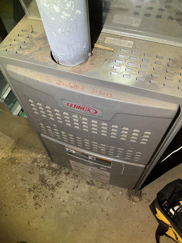 Responded to no heat complaint for a 16-year-old Lennox 80% efficiency furnace. Upon arrival, system was maintaining 63°F with intermittent heating issues. Performed comprehensive inspection including filter check, amp draw verification, pressure switch port cleaning, and ignition testing. System functioned properly during multiple test cycles, raising temperature to 68°F during service visit. Identified potential intermittent issue requiring further monitoring. Recommended comfort advisor consultation due to system age.