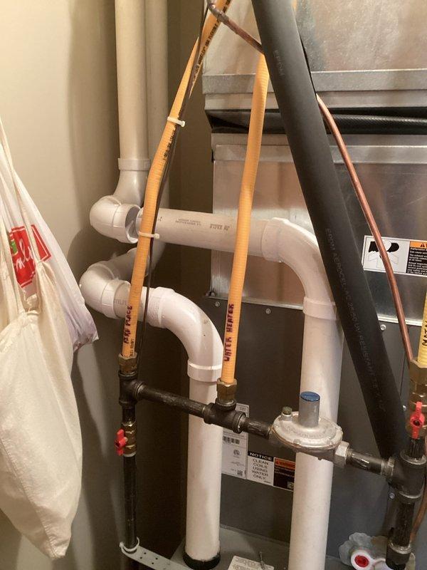 Diagnosed system showing pressure switch code on 2-year-old Lennox furnace that was cycling briefly before shutting down. Inspection revealed frozen exhaust venting on rooftop as root cause. Successfully thawed ice blockage in vent pipe, drained the venting system, and verified proper system operation through multiple test cycles.