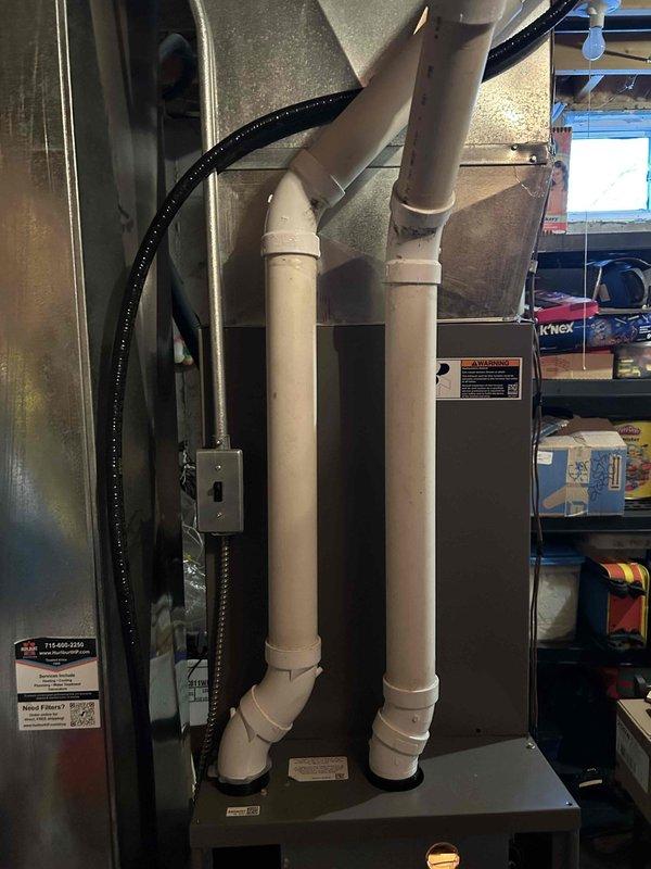 Diagnosed and resolved a no-heat issue on a 2-year-old Lennox furnace that had previously tripped out after repair. Upon thorough inspection of heat exchanger cells and burners, discovered incorrectly swapped exhaust terminations causing recirculation and rollout trip. Corrected the exhaust pipe configuration and verified proper operation with 40-minute run test. Removed temporary space heaters from the premises.