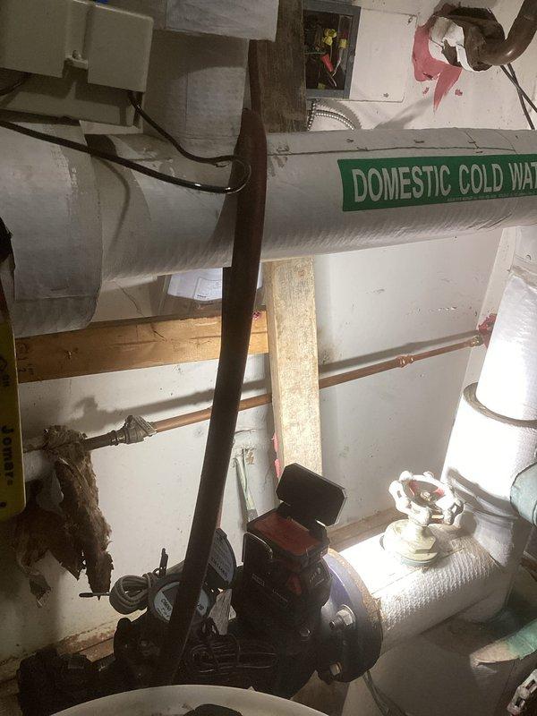 Responded to emergency call for flooded boiler room. Diagnosed burst pipe at hose bibb connection that had frozen and failed. Replaced damaged hose bibb and associated piping to restore system functionality and prevent further water damage.