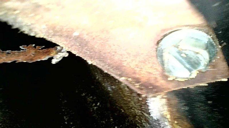 Responded to no heat call for 15-year-old furnace system. Inspection revealed 1986 70% efficiency furnace with severe heat exchanger deterioration, including large crack on right side burner face plate and multiple holes in exhaust. System deemed unsafe to operate; customer was informed of hazardous condition and declined repairs. Emergency service arranged for same day.