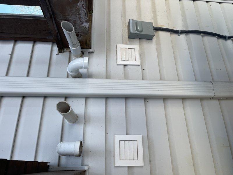 Responded to no-heat complaint where system had been inoperative for 2 days. Diagnostic inspection revealed ice blockage in exhaust vent elbow. Replaced the frozen elbow fitting with a straight pipe section and relocated the elbow to the adjacent pipe, restoring proper exhaust flow and system operation.