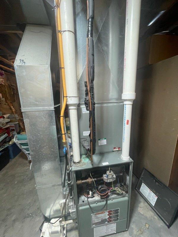 Responded to service call for intermittent furnace operation. Diagnosed issues with flame sensor and limit switches. Inspected 20-year-old unit that was cycling off prematurely. Cleaned flame sensor to remove white residue buildup and tested limit switch system. Verified proper operation after maintenance and confirmed system is currently functioning correctly.