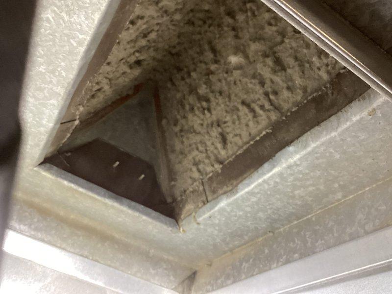 Diagnosed system with insufficient heating and poor airflow caused by severely clogged evaporator coil. Performed thorough cleaning of evaporator coil mounted above furnace to restore proper airflow. Conducted comprehensive furnace inspection with heat exchanger integrity check, followed by successful test run confirming restored heating performance and proper system operation.