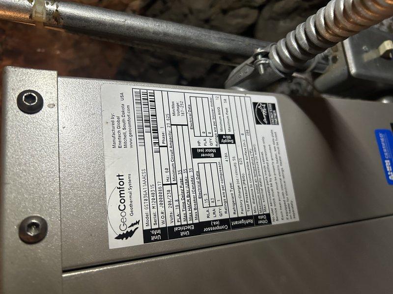 Responded to no heat service call for a residence with dual heating system (geothermal and propane furnace). Upon arrival, found furnace operating but struggling to maintain temperature in poorly insulated home. Diagnosed system was functioning correctly but efficiency was compromised by severely clogged air filter. Replaced air filter and verified normal operation of both heating systems. Determined geothermal unit was running properly but unable to keep up with heating demand in cold conditions, causing automatic switchover to propane furnace as designed.