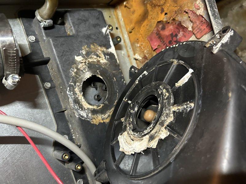 Responded to no-heat call for 15-year-old furnace. Diagnosed seized inducer motor and found broken drain kit leaking water and exhaust fumes into furnace cabinet. Provided customer with repair options for inducer motor, drain kit, and thermostat replacement, along with replacement furnace option for comparison. Customer will review options before deciding on repair versus replacement.