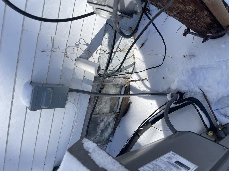 Responded to no-heat call for a 4-month-old Lennox heating system. Diagnostic inspection revealed frozen vent pipe causing system failure. Corrective action taken: cut off affected section of vent pipe and verified proper furnace operation, restoring heat to residence.