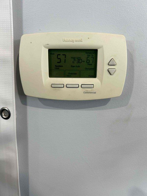 Responded to no heat complaint at commercial building with 20+ year old furnace. Diagnosed faulty heating relay that was chattering badly. Performed reset which temporarily restored operation, but relay requires replacement. Current building temperature at 57°F. Submitted estimate for relay replacement to customer via email pending approval.