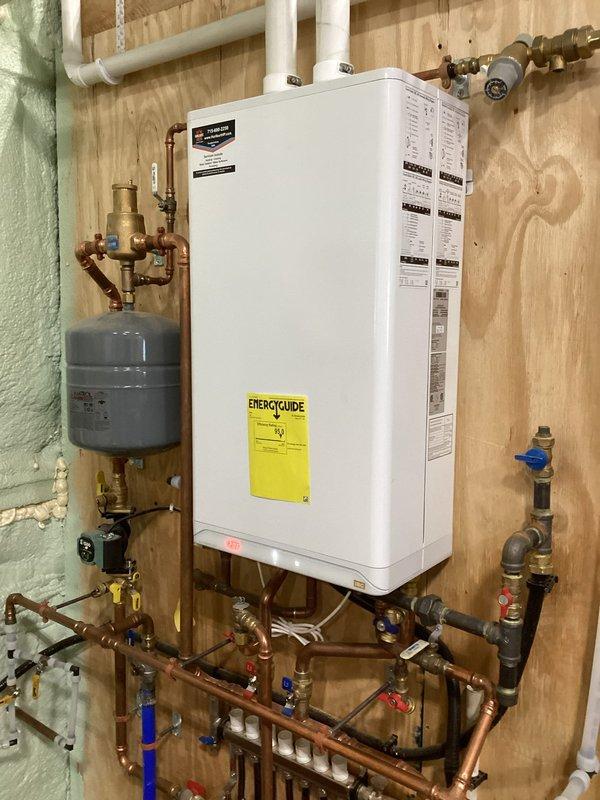 Responded to no-heat call for one-year-old boiler system showing flame failure code. Diagnosed fluctuating propane pressure as root cause, bled off excess pressure to temporarily restore operation. Contacted customer's propane supplier who scheduled same-day service to check regulators and refill tank (below 30% capacity). Confirmed boiler operating correctly after pressure stabilization.