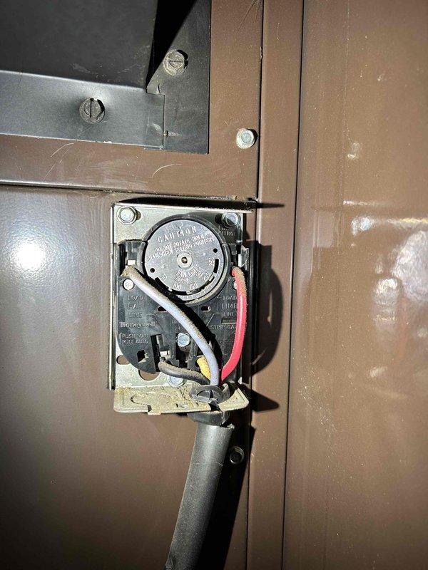 Responded to no-heat call for an aging oil furnace (65+ year old home). Diagnosed intermittent ignition failure in the primary oil control system. Found significant wear on Honeywell limit control switch and deteriorated components with visible oxidation. Replaced faulty igniter and primary control, restored proper cycling sequence, and verified consistent ignition. System now operating normally, providing reliable heat.